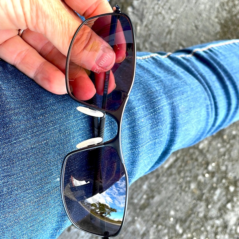Color black, Oakley sunglasses, whisker , only wore one time, nice glasses